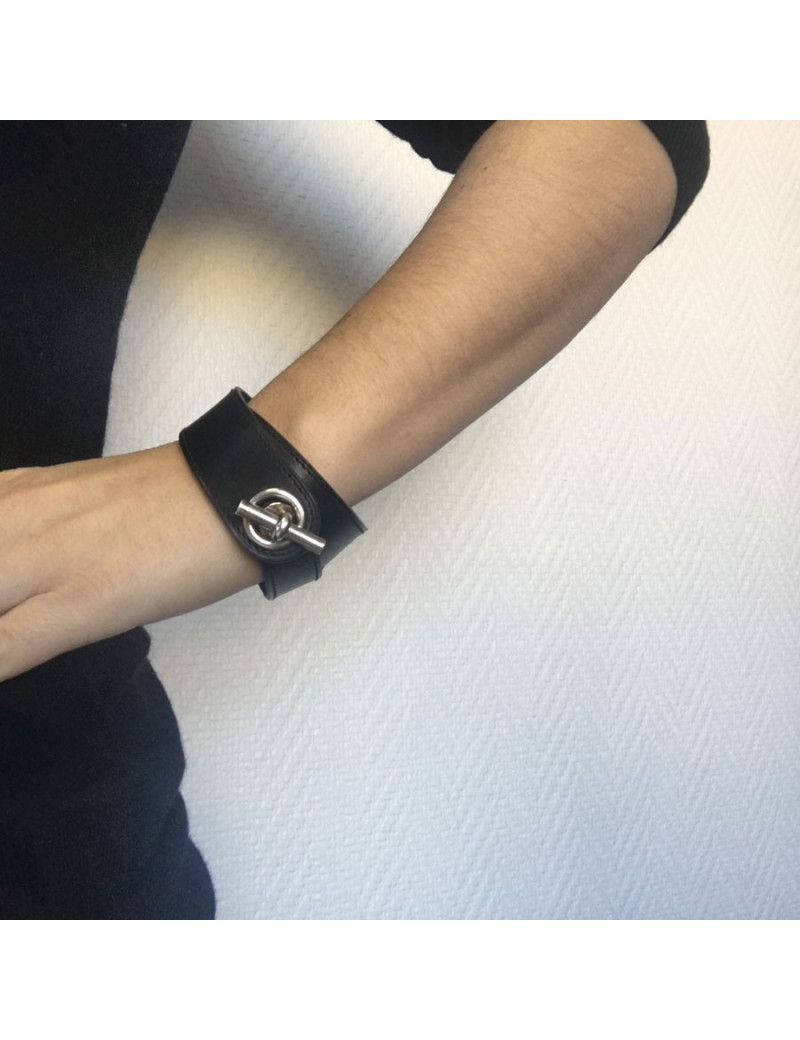 HERMES bracelet in black leather and sterling silver buckle