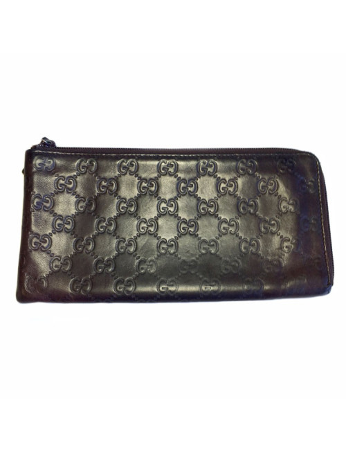 GUCCI monogram embossed brown leather pouch