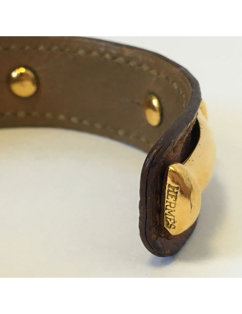 HERMES brown leather bracelet and gold bamboo
