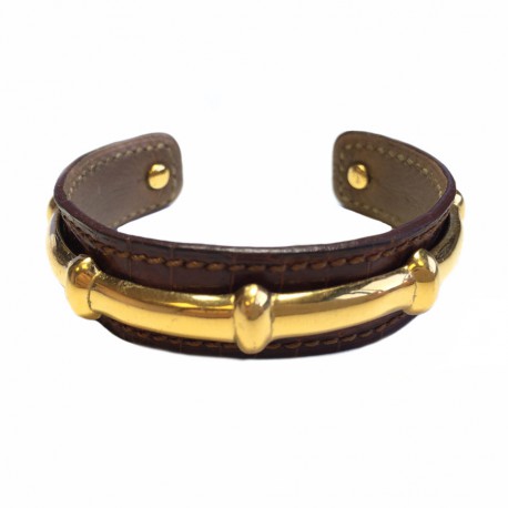 HERMES brown leather bracelet and gold bamboo