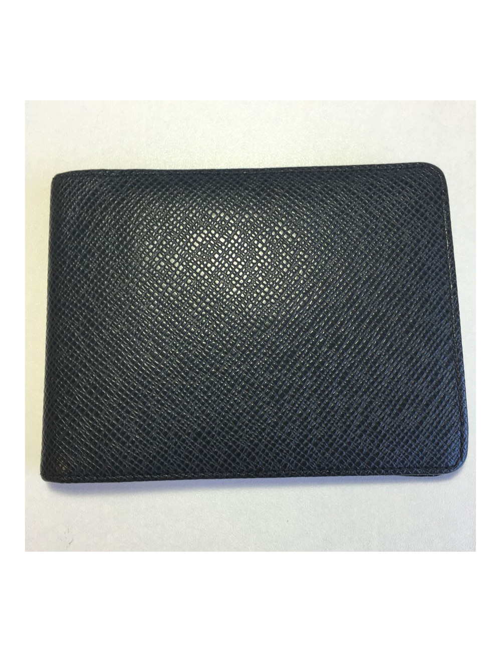 Multiple LOUIS VUITTON taiga leather wallet