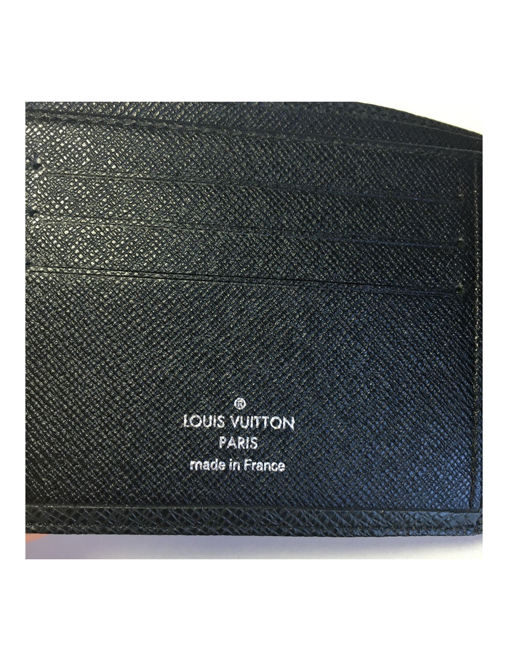 Multiple LOUIS VUITTON taiga leather wallet