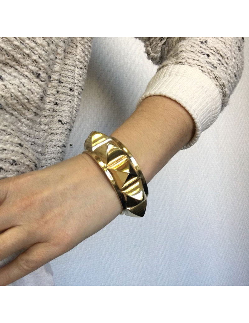 HERMES Collier De Chien rigid cuff bracelet in gilded metal