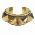 Bracelet HERMES CDC en métal doré rigide