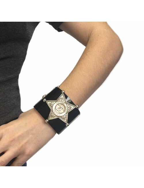 CHANEL "Paris-Dallas" cuff in black resin and jewellery gold metal
