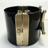 CHANEL "Paris-Dallas" cuff in black resin and jewellery gold metal