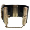 CHANEL Byzantine cuff bracelet in black resin, gilded metal and colored molten glass 