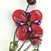 PIN LOULOU of the cliff in red and green glass