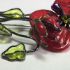 PIN LOULOU of the cliff in red and green glass