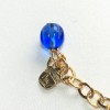 Bracelet MARGUERITE de VALOIS chaîne en métal doré et pâte de verre dans les tons bleus
