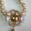 MARGUERITE of VALOIS camellia necklace in pearly beads and gold metal