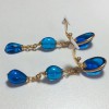 MARGUERITE of VALOIS clips blue glass paste earrings