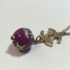 Gold metal, cc, round pendant necklace CHANEL purple and rhinestones