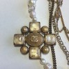 Necklace CHANEL multiple rows of beads, chains, and golden metal part