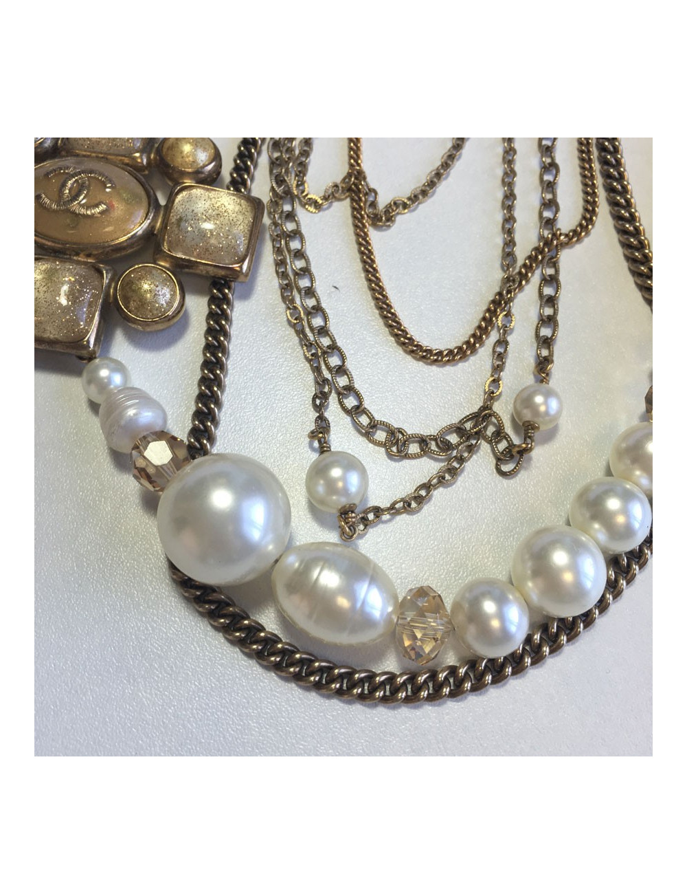 Necklace CHANEL multiple rows of beads, chains, and golden metal part