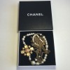 Necklace CHANEL multiple rows of beads, chains, and golden metal part