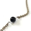 Sautoir MARGUERITE DE VALOIS chaîne argentée, strass, perles noires et blanches