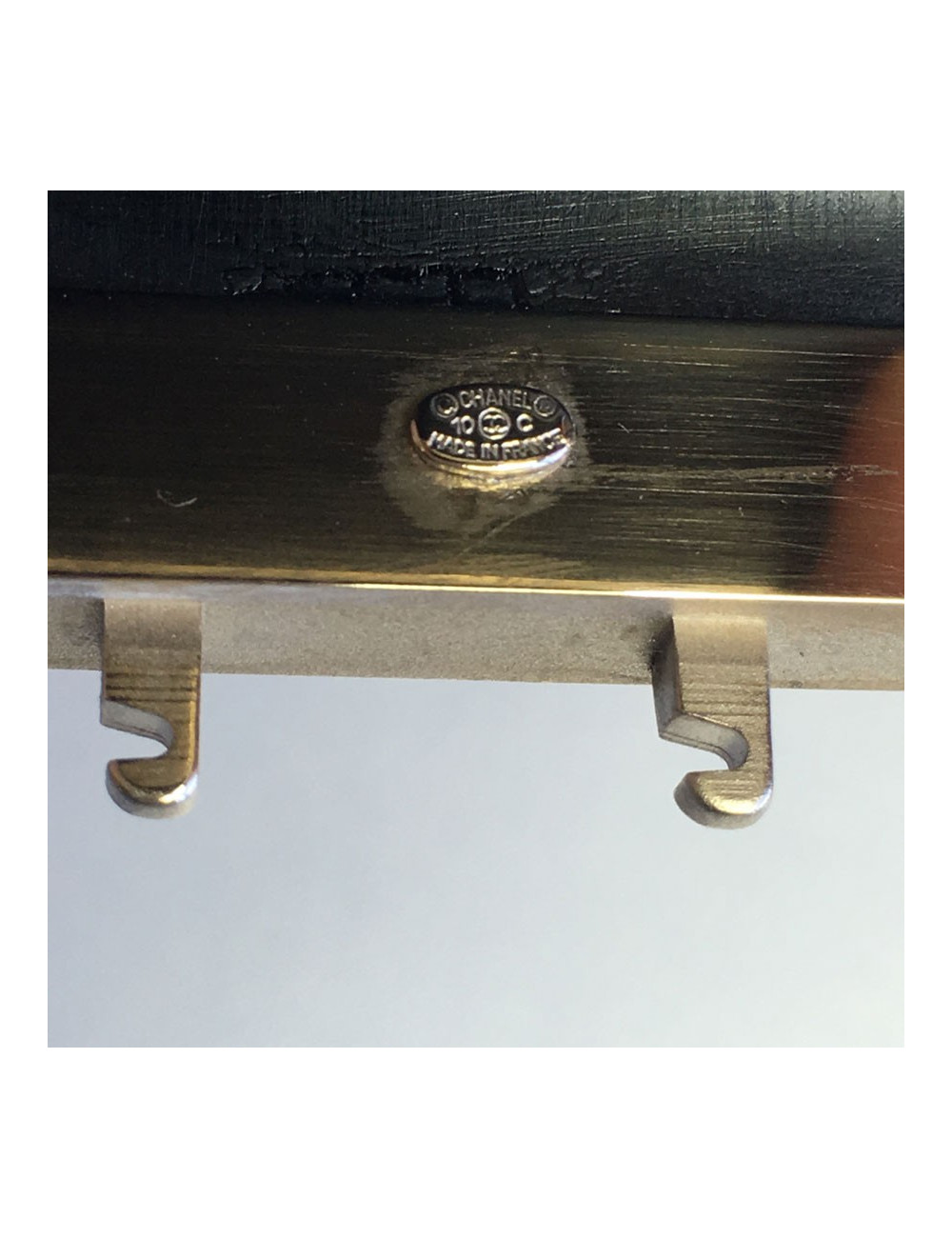 CHANEL cuff in black resin and flower in gold metal and transparent resin