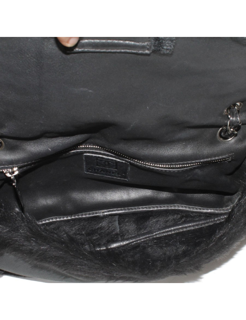 Skin returned black CHANEL bag