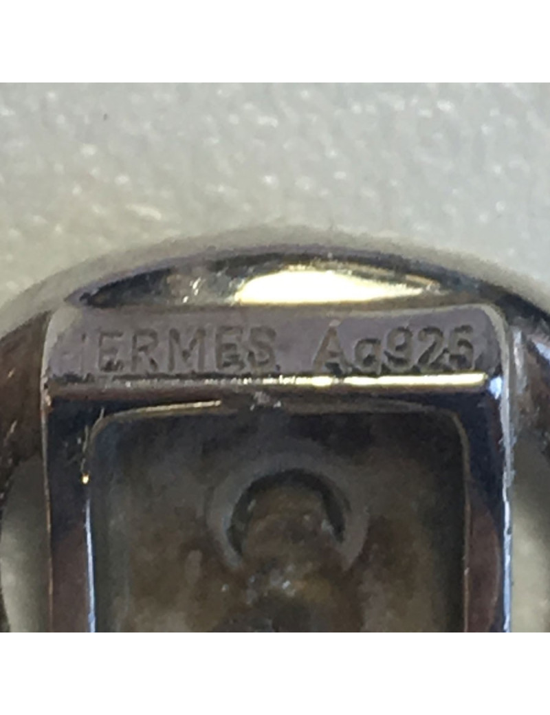 Boucles d'oreille clous HERMES en argent massif