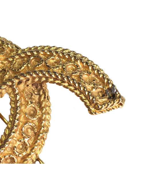 Broche CHANEL CC en métal doré