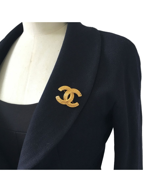Broche CHANEL CC en métal doré
