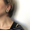 CHANEL clip-on earrings in ivory resin, pearls and gilt metal
