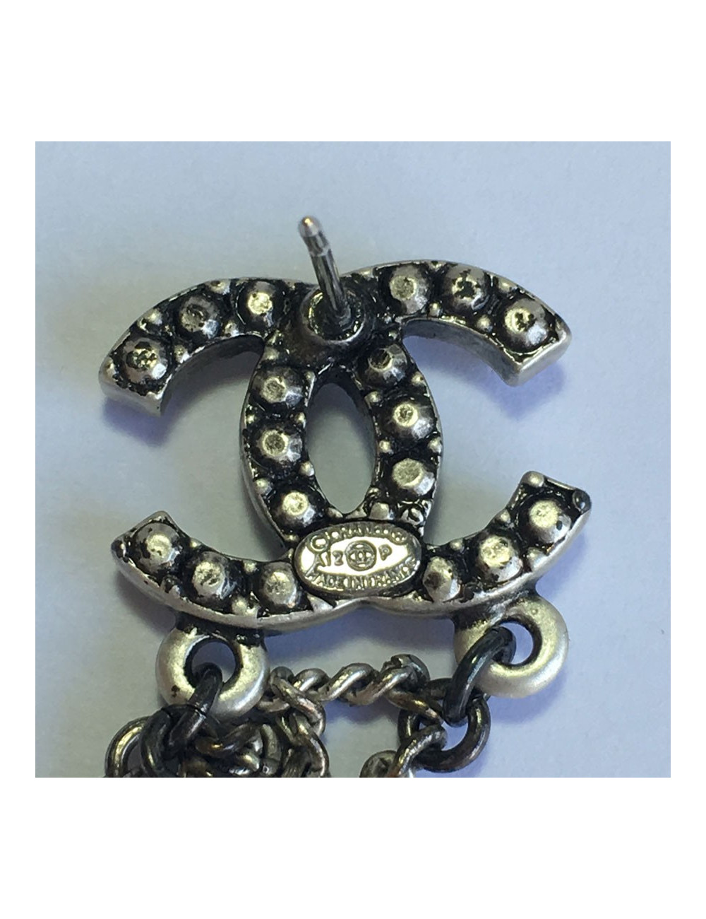 Dangling silver metal nails CHANEL CC earrings