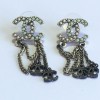 Dangling silver metal nails CHANEL CC earrings