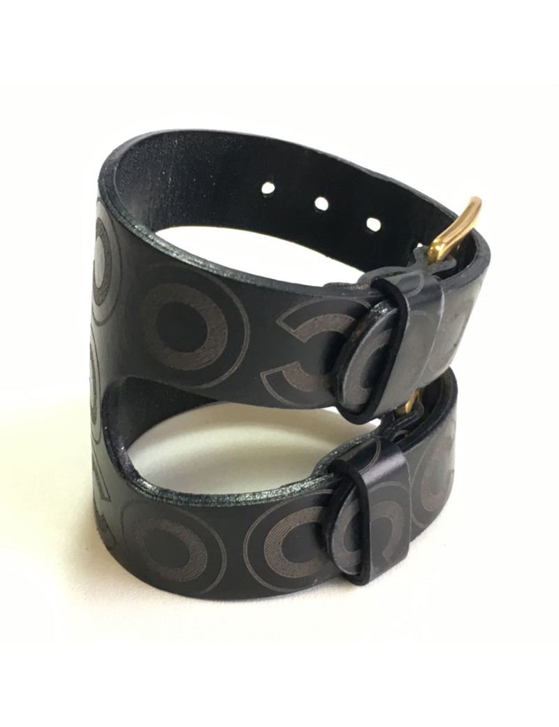 CHANEL "Coco" cuff bracelet in black leather