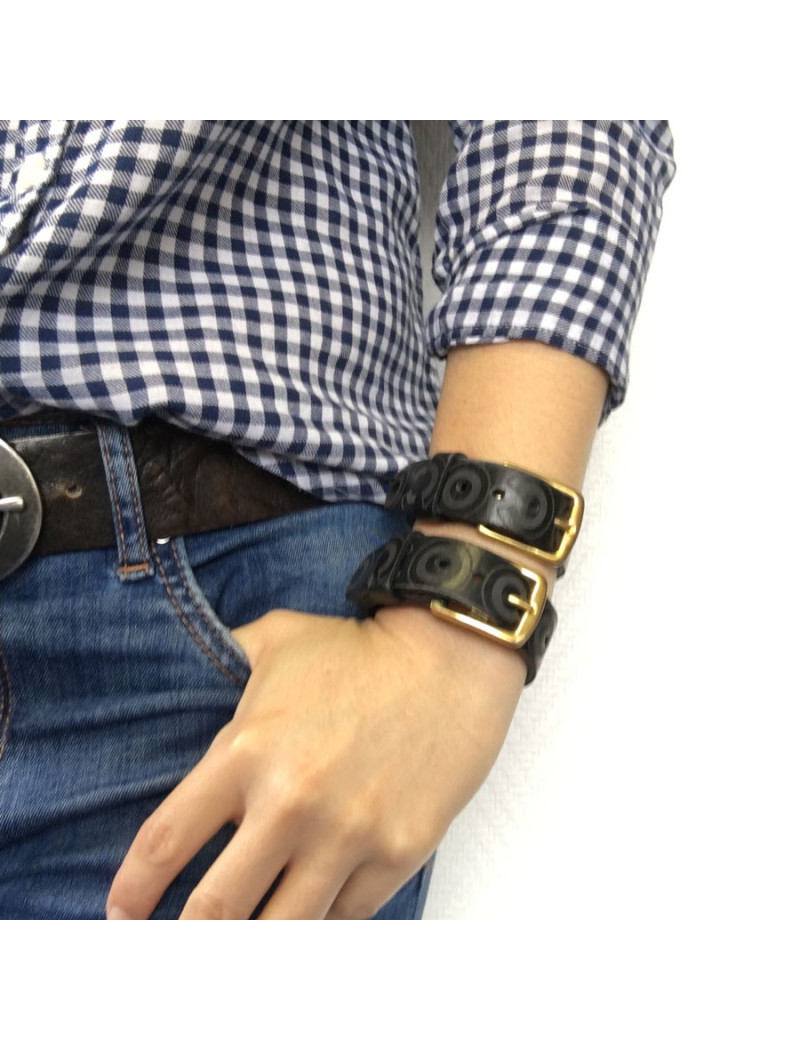 CHANEL "Coco" cuff bracelet in black leather