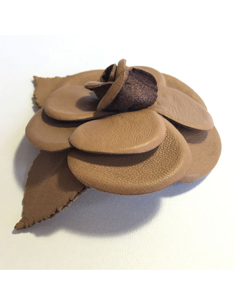 CHANEL camellia brooch in glossy brown leather