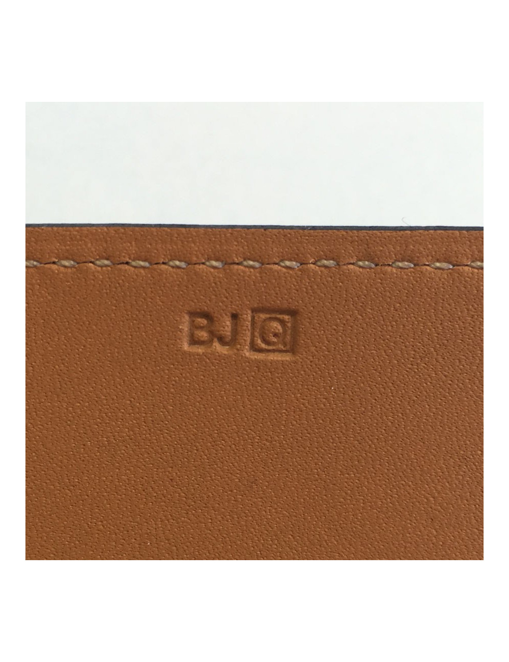 Bracelet HERMES cuir fleuron veau chamonix noir et laiton