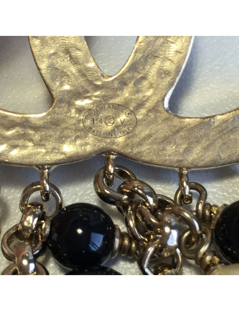 Broche CHANEL CC et breloques en métal doré