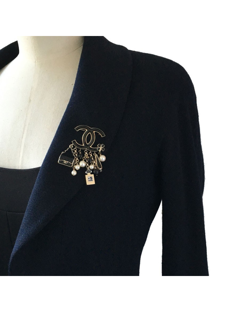 Broche CHANEL CC et breloques en métal doré