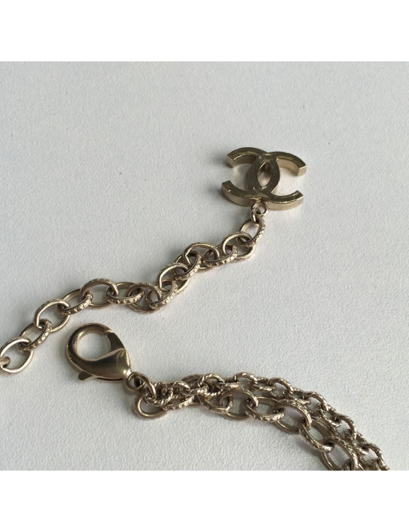 Sautoir CHANEL "100 ans" chaîne couleur or pâle et médaillons