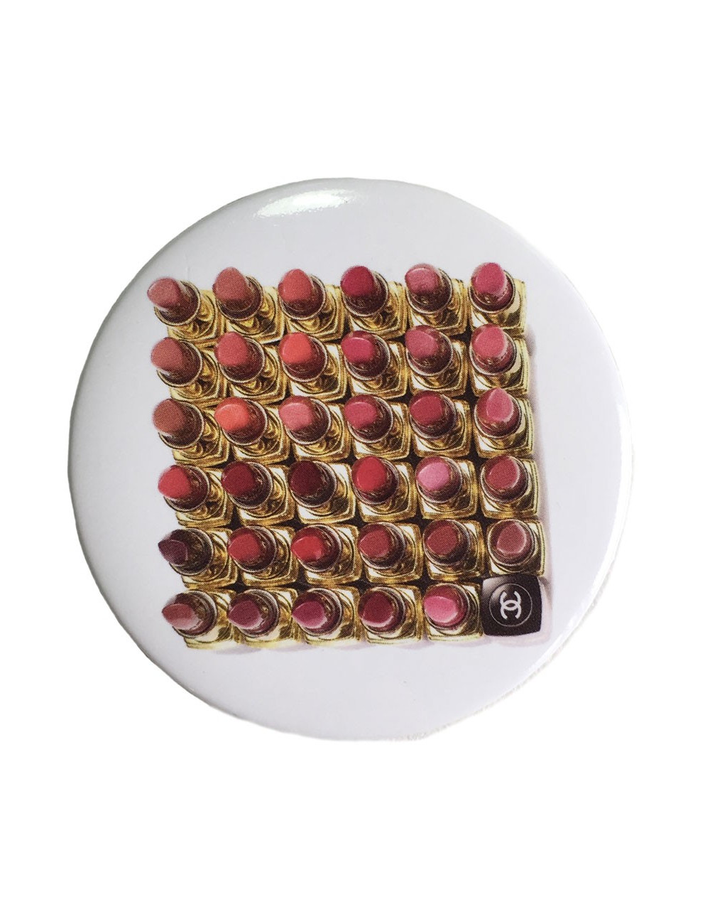  Pin's CHANEL rond en métal blanc