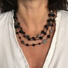 Collier CHANEL triple rangs en métal argenté, perles noires et strass blancs et noirs