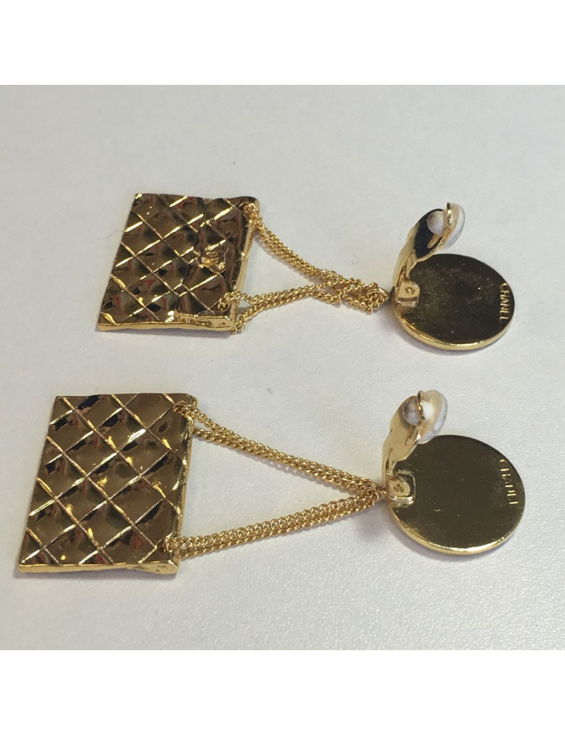 Boucles d'oreille clips CHANEL couture et collector dorés