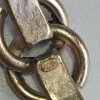 Bracelet CHANEL en métal doré or pâle et CC serti de strass