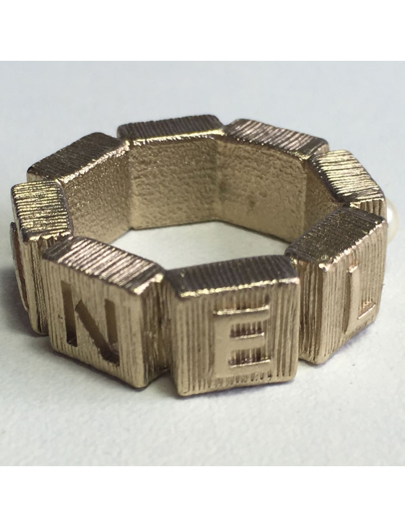 CHANEL ring in gold metal and Pearly Pearl T53