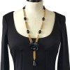 CHANEL Couture necklace qith gilded metal chain and black Camellia