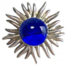 Broche BALMAIN Soleil en métal argenté et centre bleu