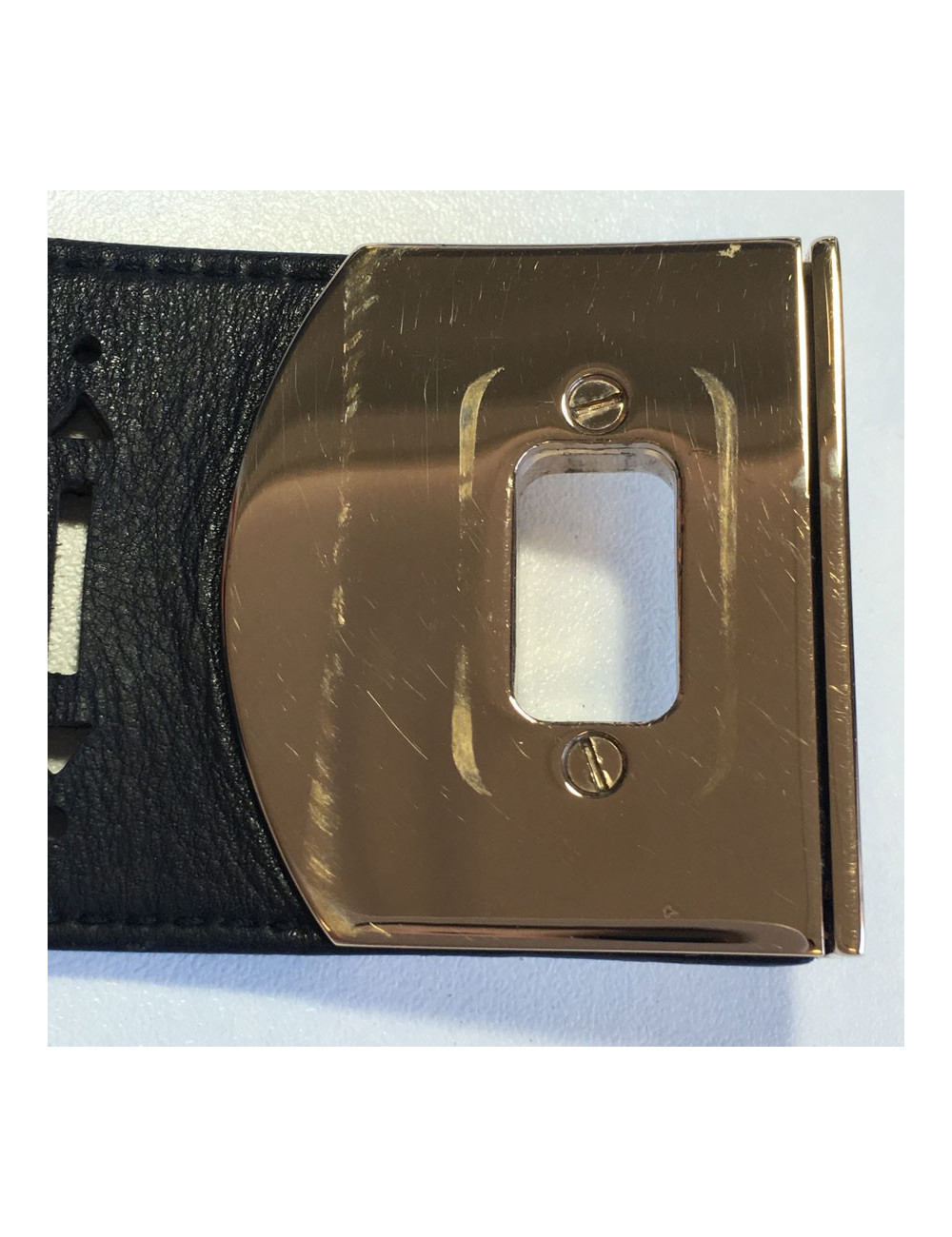 Manchette SERGIO ROSSI en cuir noir et bijouterie argentée