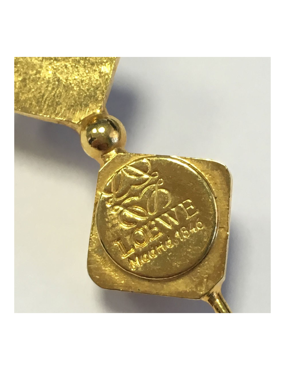 PIN LOEWE gold and glass vintage