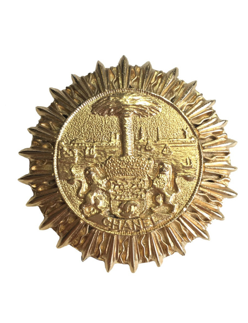 Broche CHANEL ronde vintage en métal doré