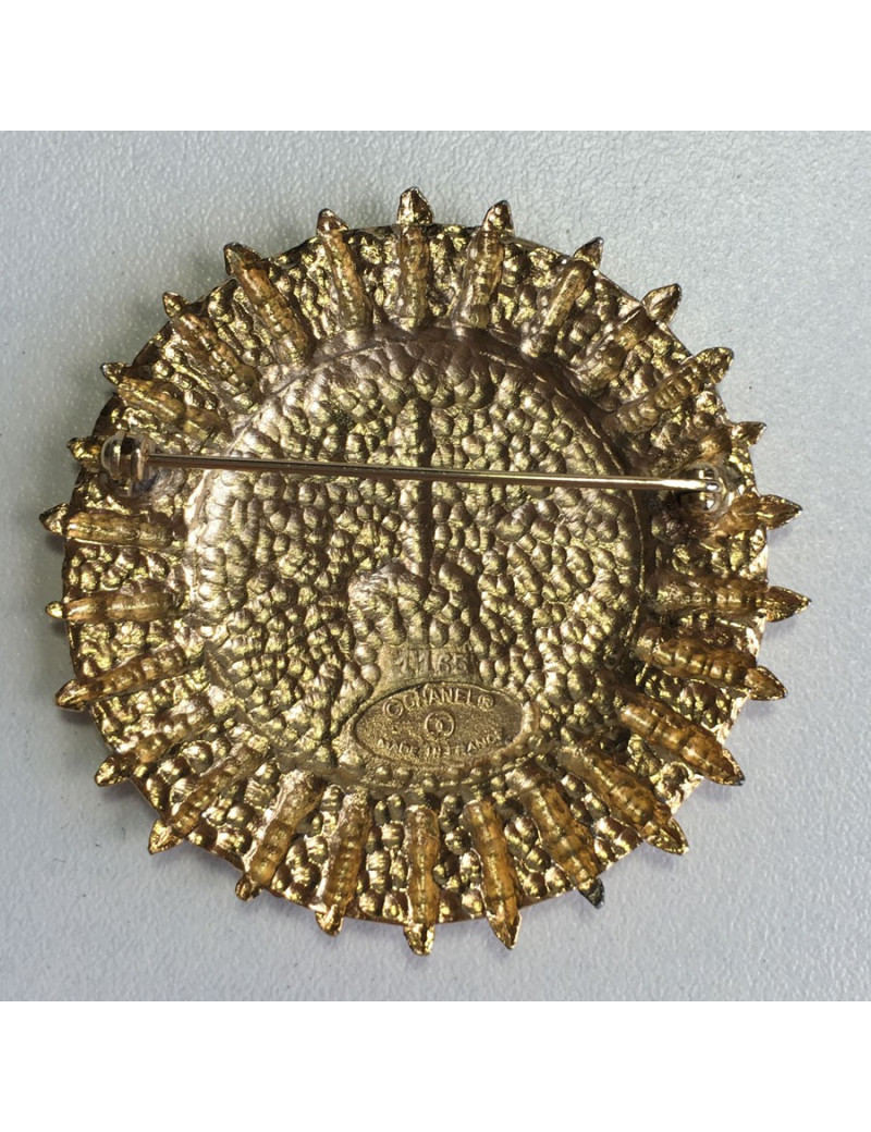 Broche CHANEL ronde vintage en métal doré