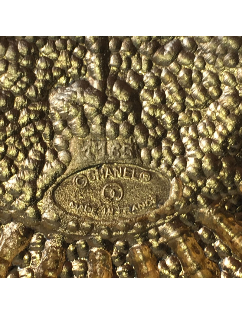Broche CHANEL ronde vintage en métal doré