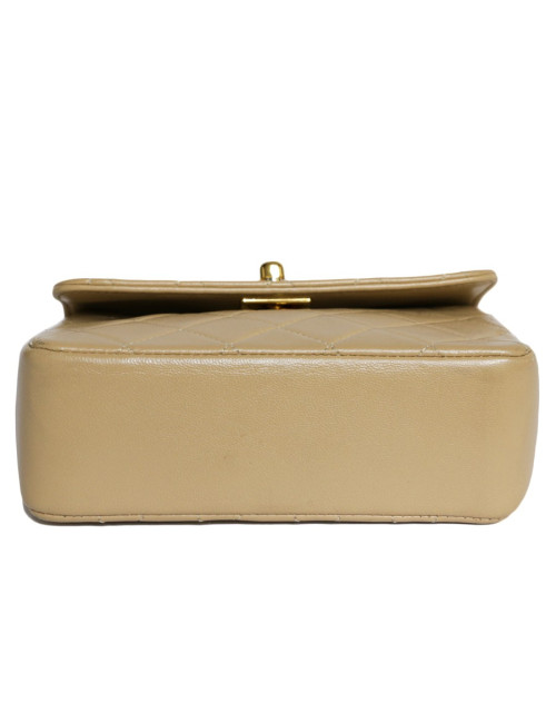 Mini quilted CHANEL bag beige