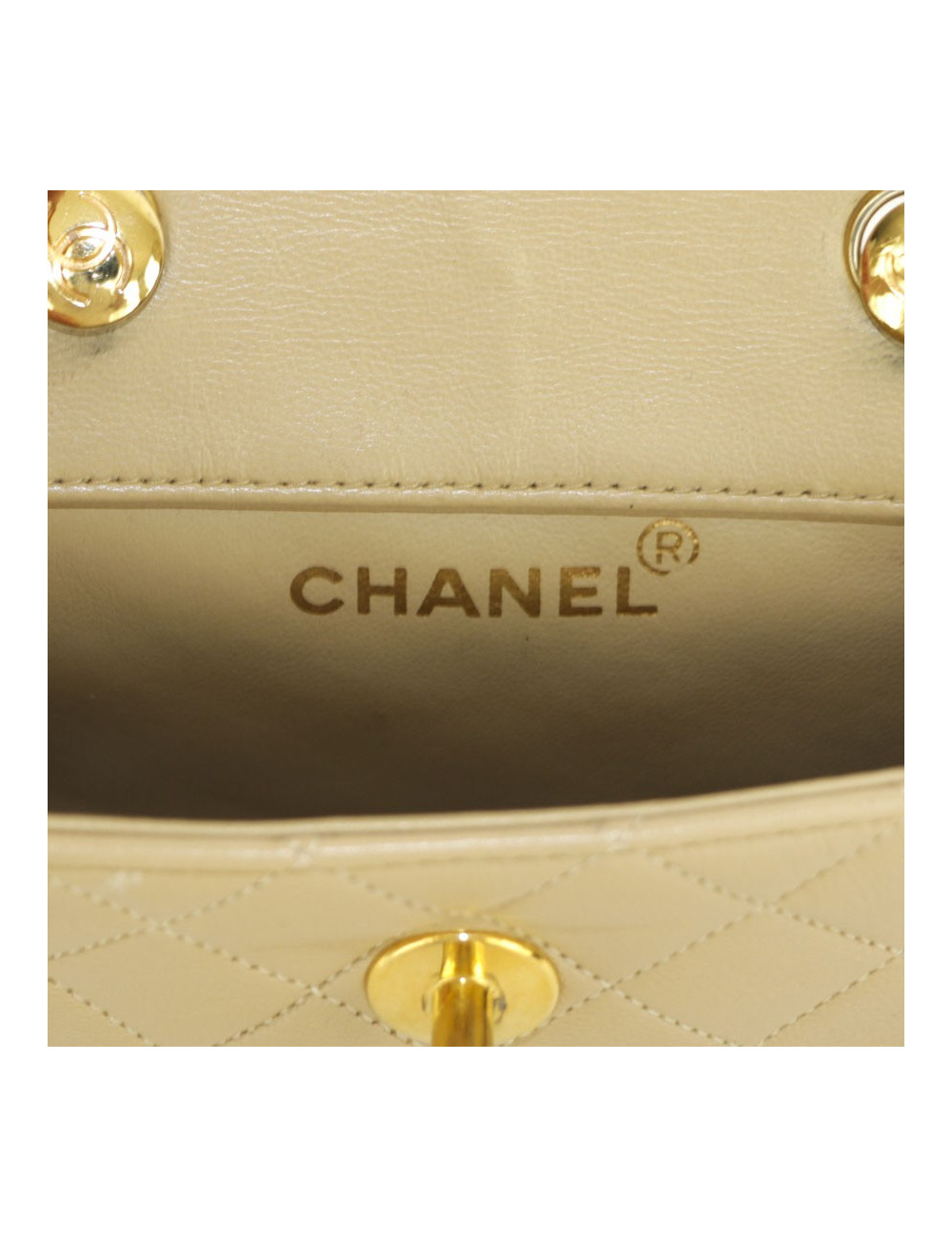 Mini quilted CHANEL bag beige